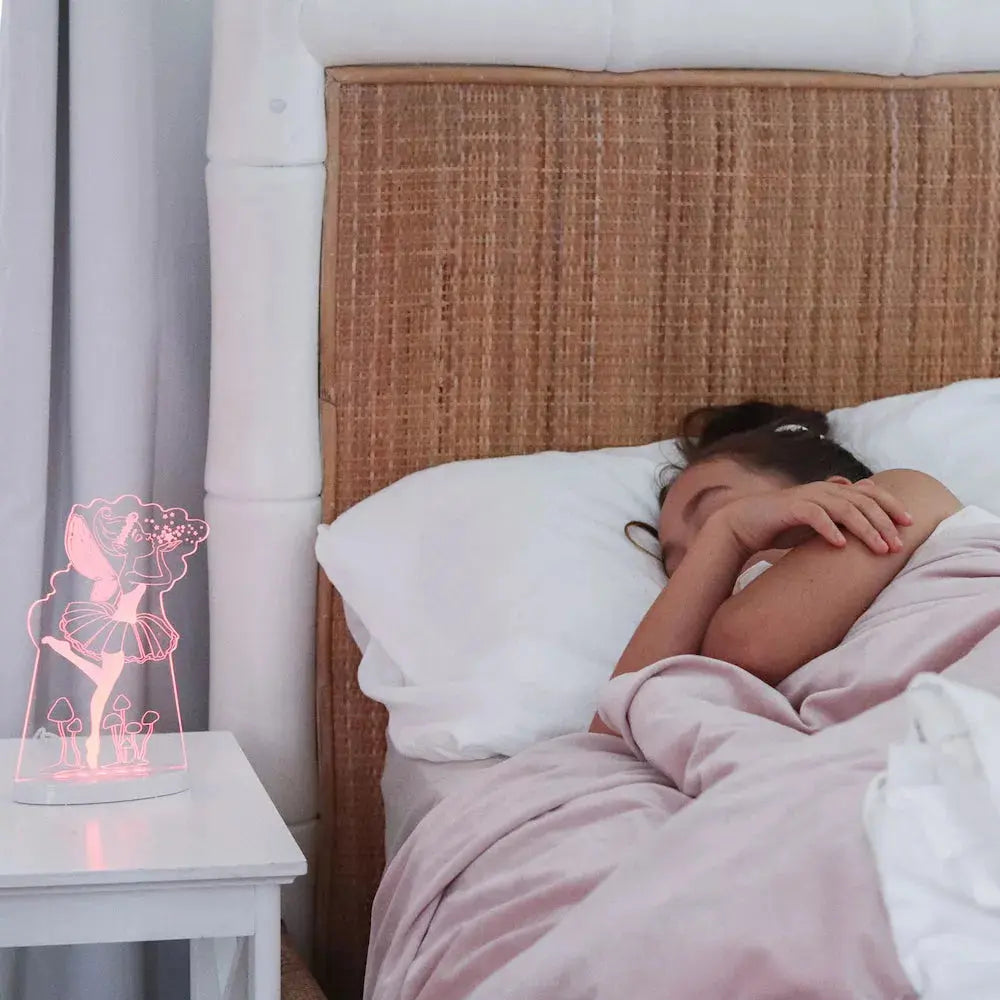 Child sleeping with fairy night light